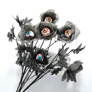 Halloween bouquet with black roses and realistic eyeballs on a white background