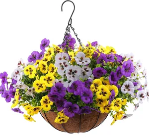 Close-up of artificial pansies in a metal wire hanging basket with natural coco liner
