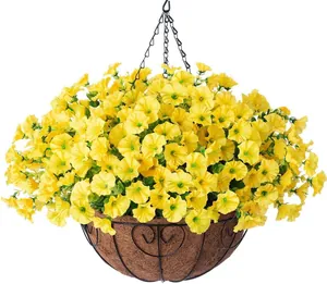 Detail of hanging basket with artificial yellow petunias and green eucalyptus leaves