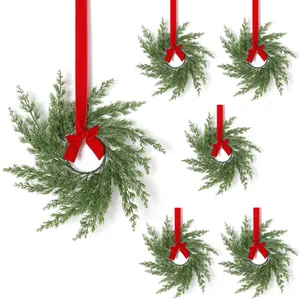 Set of 6 mini Norfolk pine Christmas wreaths with decorative red ribbons and bows