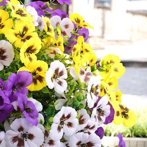 Close-up of lifelike yellow purple and white pansies with natural petal textures