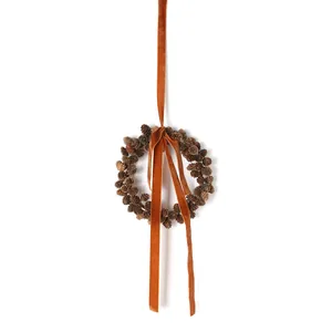 Natural pine cone wreath with premium burnt orange velvet ribbon for Christmas wall decor