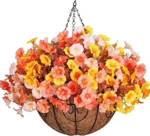 Hanging basket with artificial orange and yellow petunias and eucalyptus on white background