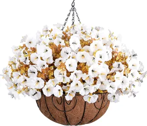 Detail of hanging basket with artificial white petunias and eucalyptus in iron frame