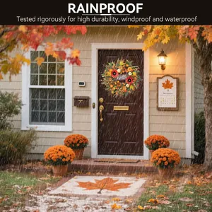 Detail of rainproof autumn wreath with sunflowers and pumpkins on a home front door