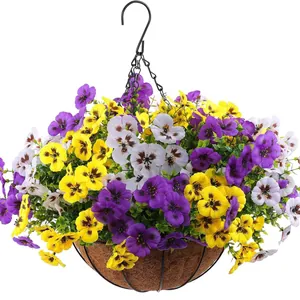 Hanging basket with colorful artificial pansies in purple, yellow, and white silk