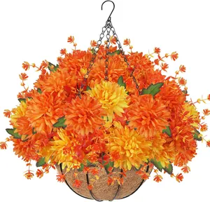 Close-up of bright orange artificial chrysanthemum in coconut fiber hanging basket