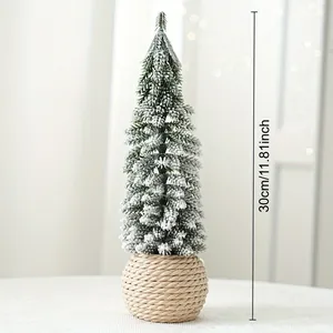Detailed view of a 30cm flocked mini Christmas tree with a rustic woven base