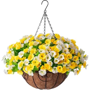 Close-up of yellow and white silk morning glory flowers in a coconut fiber hanging basket