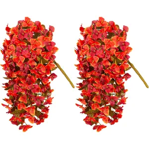 Detail of vibrant red and orange artificial bougainvillea vines with dense silk flower clusters