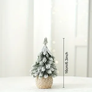 Miniature 16cm flocked cedar Christmas tree with snow effect in a straw basket base