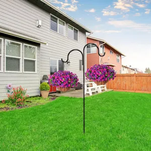 Double shepherd's hook in black metal with hanging baskets of purple morning glory flowers