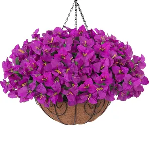 Detail of hanging basket featuring purple bougainvillea and heart-pattern metal frame