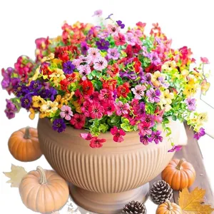 Artificial eucalyptus and morning glory silk flowers in a rustic pot with autumn decor