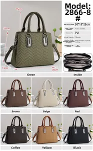 Detail view of stylish handbag showing multi-compartment interior and 30x23cm size specs