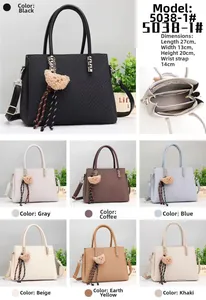 Detail view of woven leather tote bag showing 27x20x13cm size and internal compartments