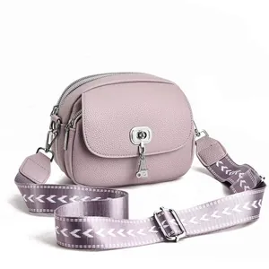 Sac bandoulière chic lilas en similicuir avec large bandoulière à motifs