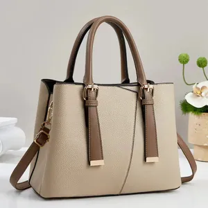 Große Retro-Handtasche für Damen aus beigem und braunem Kunstleder für den Alltag