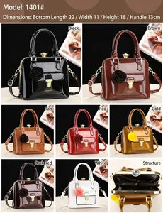 Detail view of glossy shell-shaped handbags in multiple colors with floral charms