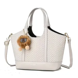 Large capacity PU leather tote bag with woven texture and plush ball charm in beige