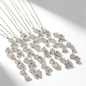Silver crown letter pendant necklace with sparkling zirconia fashion jewelry for women.
