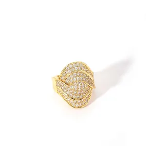 Detailed view of wide gold-plated stainless steel ring with full-pavé diamond setting