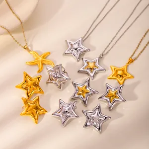 Conjunto de joyas de acero inoxidable bicolor con collar de estrella y anillos a juego