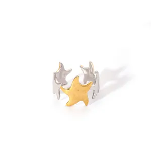 Detail of starfish open ring featuring a stylish gold and silver two-tone metal finish