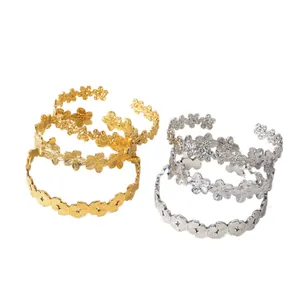 Minimalist 18k gold and silver stainless steel open bangle with flower and butterfly design