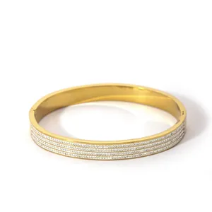 18K gold plated stainless steel hinge bangle featuring three rows of sparkling zircon stones