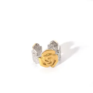Detail of two-tone adjustable ring featuring a gold rose center with silver petals