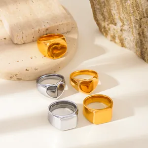 Minimalist stainless steel rings set in gold and silver with heart and square designs