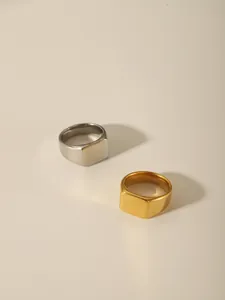 Polished gold and silver stainless steel signet rings with square face detail