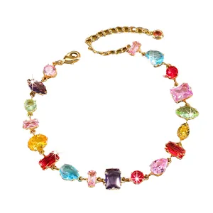 Irregular colorful zircon bracelet with faceted multi-shaped gemstones in gold setting