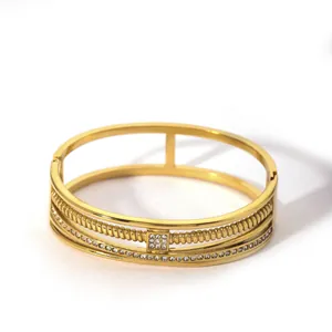 Three-layer gold-plated bangle with micro-set cubic zirconia and twisted texture