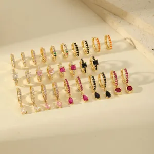 Minimalist gold earrings collection featuring colorful zircon stones in various shapes