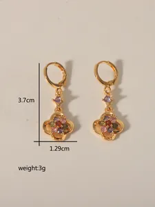 Detail view of gold earrings with multicolor stones and 3.7cm x 1.29cm dimensions