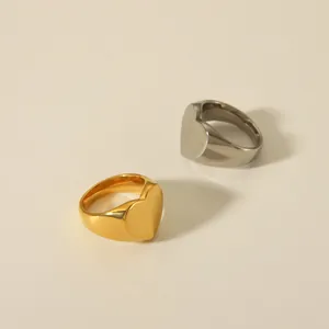 Polished heart signet rings in gold and silver finish, minimalist stainless steel jewelry