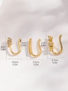 Detailed view of three gold-plated nose cuffs with cubic zirconia and size measurements