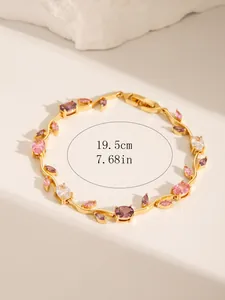 Detail eines 19,5 cm Goldarmbands mit farbigen Zirkoniasteinen in Blattform
