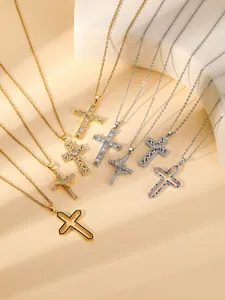 Stainless steel gold and silver paved rhinestone cross pendant necklace detail view.