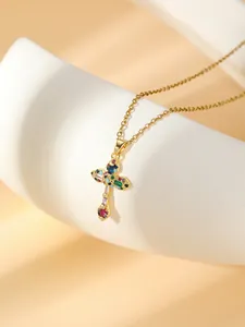 Gold-plated stainless steel cross necklace featuring dazzling multi-color crystal gemstones.