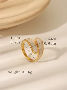 Detail view of vintage gold ring with cream enamel inlay and precise size measurements