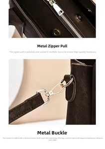 Détail de la ferrure en métal doré et fermeture éclair sur le sac à main en cuir marron