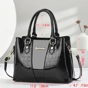 Detailed size chart for black embossed leather handbag with 28cm length and 20cm height