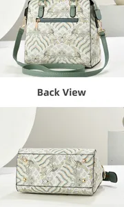 Back view and bottom details of embroidered handbag with zipper pocket and metal studs