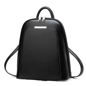 Minimalist black glossy leather backpack for women with silver metal trim and top handle