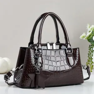 Elegant wine red patent leather crossbody bag with star charm and crocodile texture