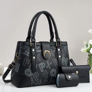 Three-piece black faux leather handbag set with white letter prints and gold hardware