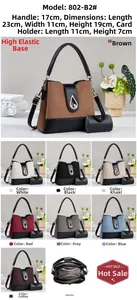 Detailed view of bicolor macaron handbag set with metal clasp and interior structure